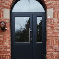 Porte PVC arrondi Gealan S8000 gris anthracite Overijse